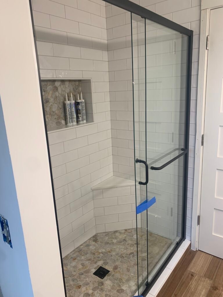 Newly Installed Shower Door In Bathroom